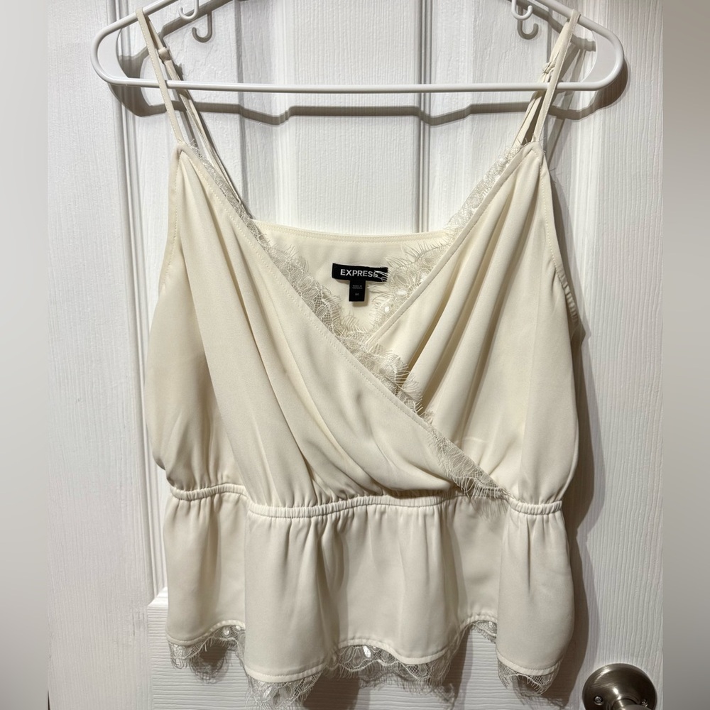 Express cream blouse with lace details. Size medium.